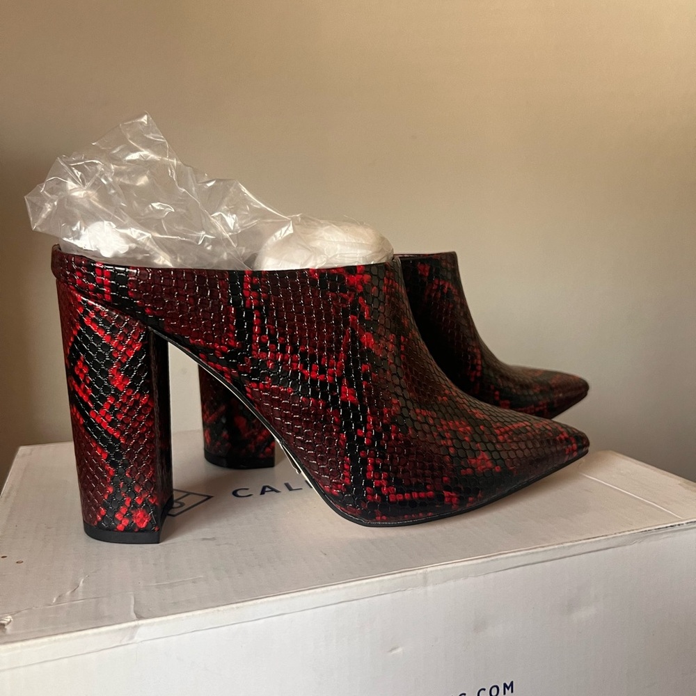 Red and black snake print mule heels